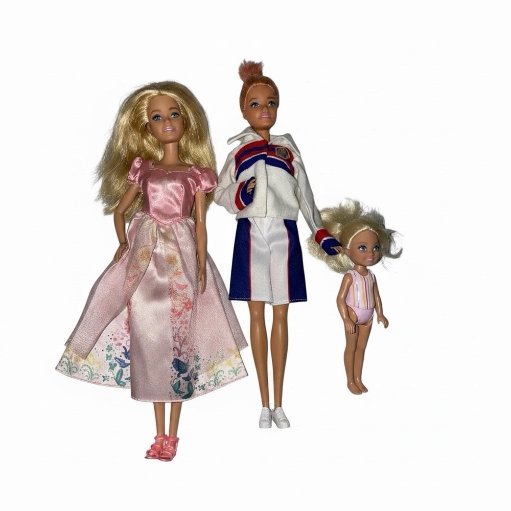 collection of three Mattel Barbie and Chelsea/Kelly-sized dolls